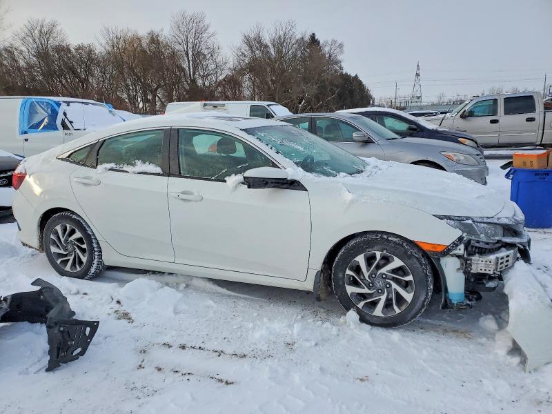 Foto 4 de la subasta – 2019 HONDA CIVIC con VIN 2HGFC2F73KH030711