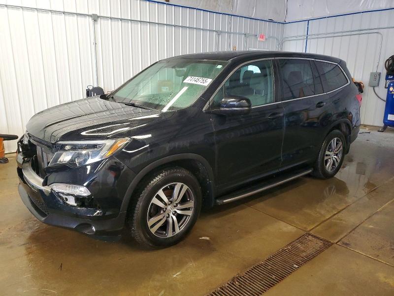 HONDA PILOT EXL 2016 with VIN 5FNYF6H58GB034350 - Photo from auction