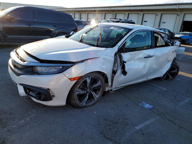 HONDA CIVIC TOUR 2016 with VIN 19XFC1F94GE044999 - Photo from auction