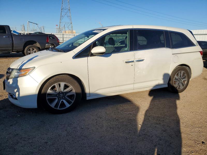 HONDA ODYSSEY TO 2014 with VIN 5FNRL5H99EB074203 - Photo from auction