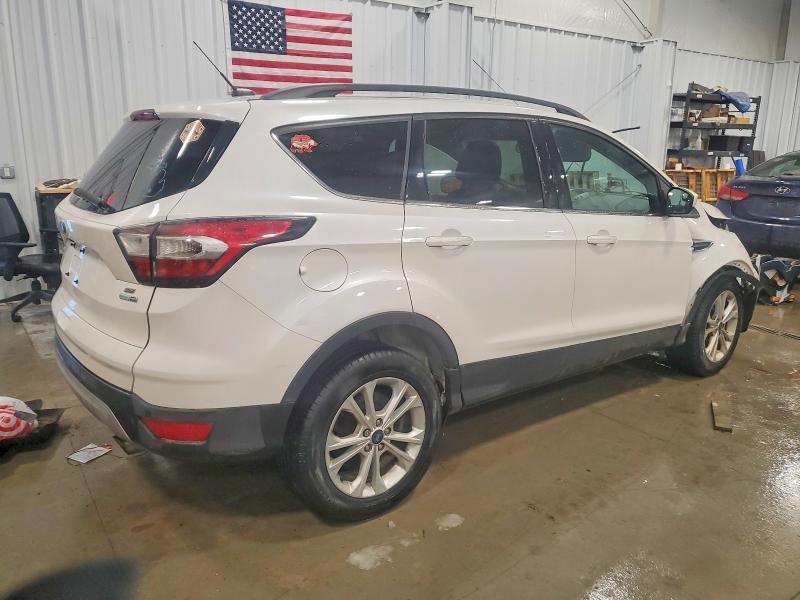Photo 3 from auction – 2017 FORD ESCAPE with VIN 1FMCU9GD1HUA66278