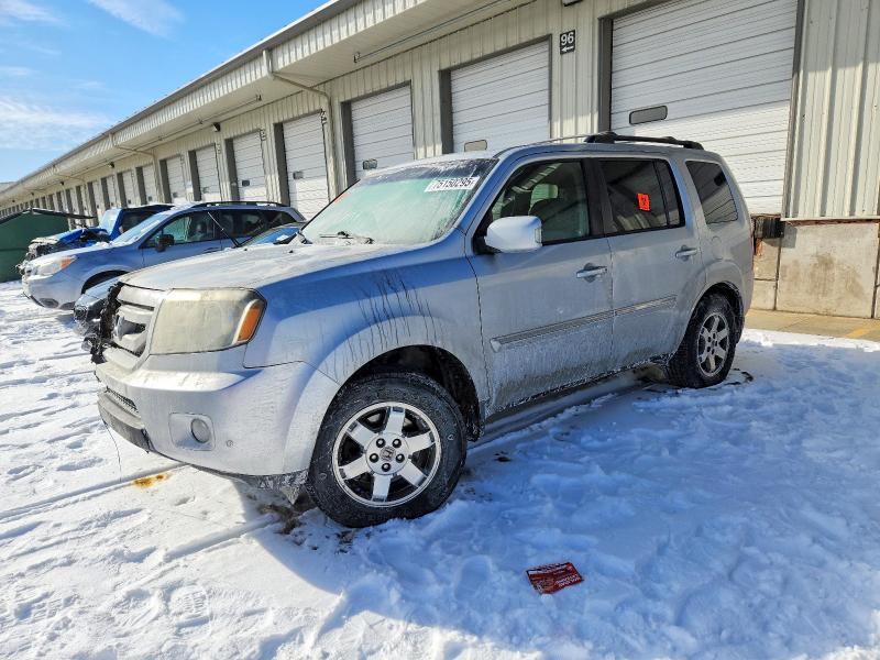 HONDA PILOT TOUR 2011 with VIN 5FNYF4H98BB076629 - Photo from auction