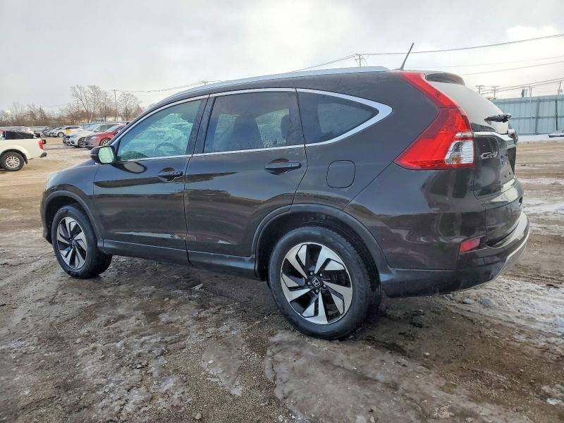 Photo 2 from auction – 2016 HONDA CR-V TOURI with VIN 5J6RM4H93GL101624