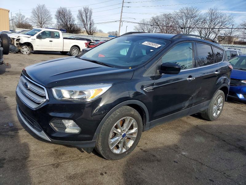 FORD ESCAPE SE 2018 with VIN 1FMCU0GD7JUA73625 - Photo from auction