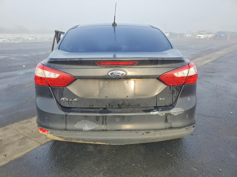 Photo 6 from auction – 2013 FORD FOCUS with VIN 1FADP3F20DL107714