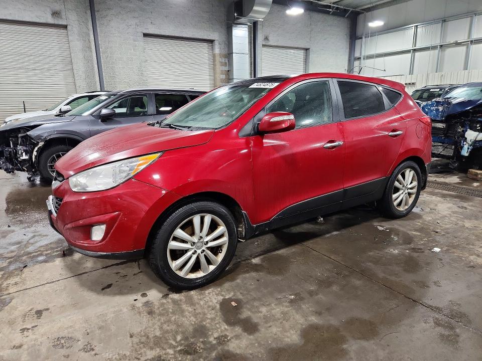 HYUNDAI TUCSON GLS 2013 with VIN KM8JUCAC8DU721079 - Photo from auction