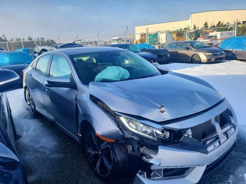 Photo 4 from auction – 2016 HONDA CIVIC with VIN 2HGFC1F41GH106918