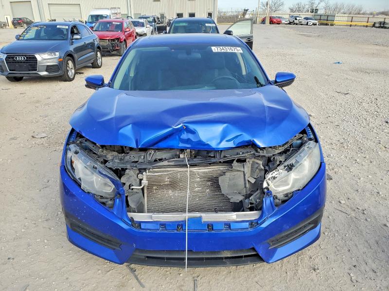 Photo 5 from auction – 2018 HONDA CIVIC with VIN 19XFC2F7XJE034098