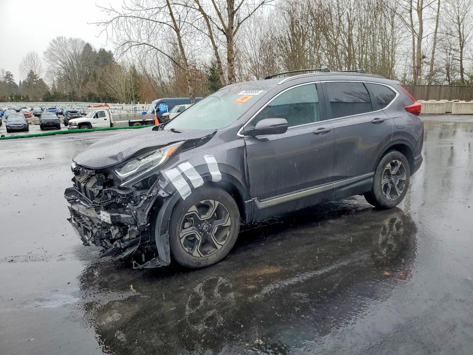 HONDA CR-V TOURI 2018 with VIN 2HKRW2H94JH633433 - Photo from auction