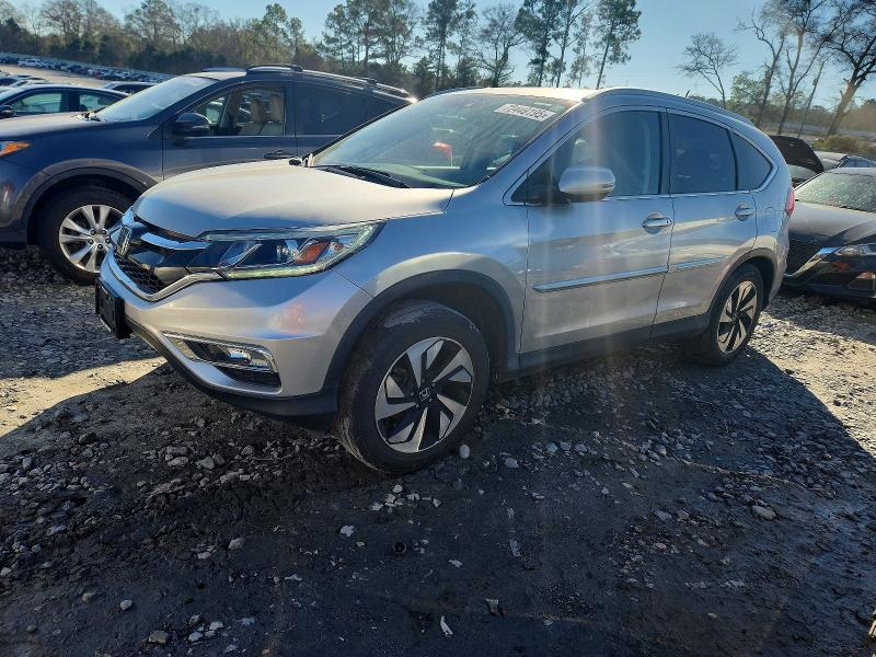 HONDA CR-V TOURI 2016 with VIN 5J6RM4H97GL098517 - Photo from auction