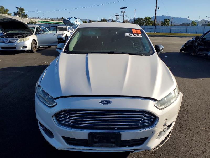 Photo 5 from auction – 2016 FORD FUSION with VIN 3FA6P0H91GR381916