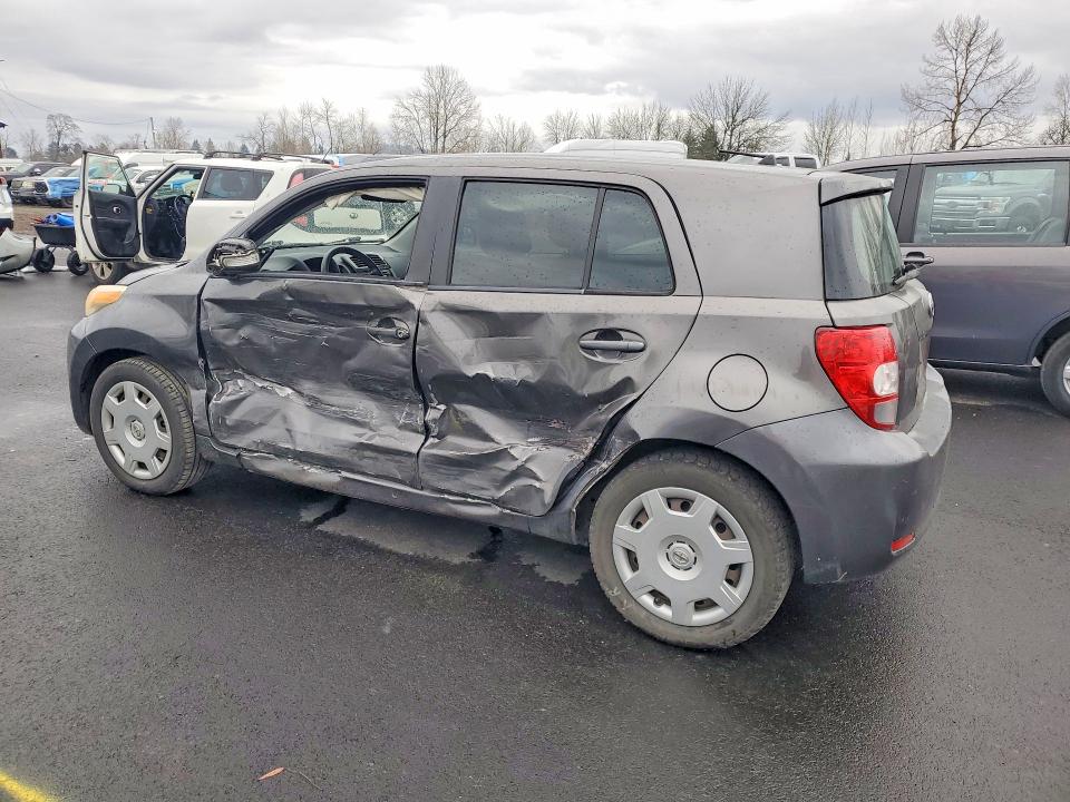 Photo 2 from auction – 2008 TOYOTA SCION XD with VIN JTKKU104X8J021622