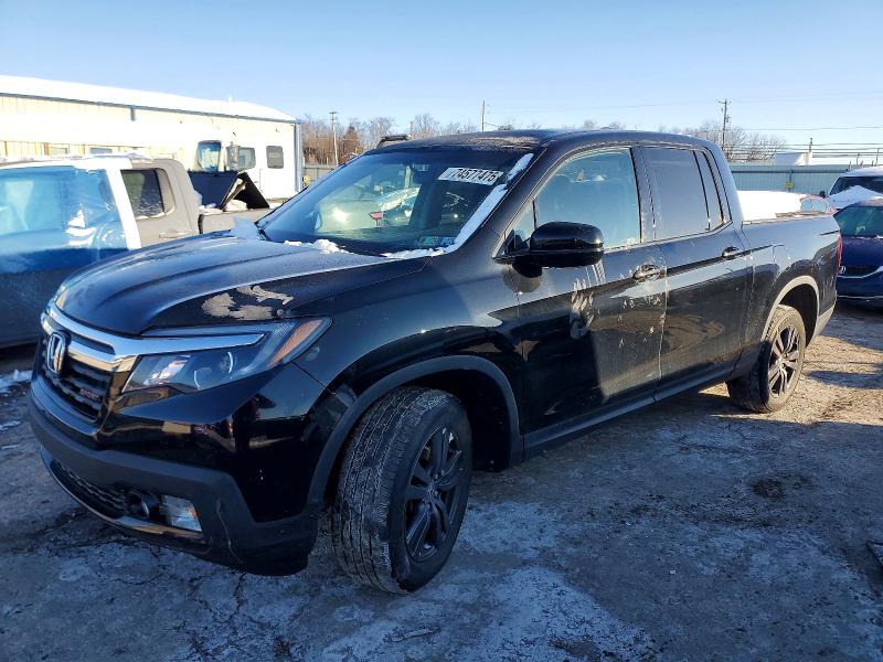 HONDA RIDGELINE 2019 with VIN 5FPYK3F11KB037228 - Photo from auction