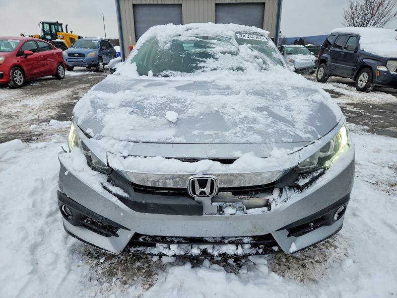 Photo 5 from auction – 2018 HONDA CIVIC with VIN JHMFC1F37JX037353