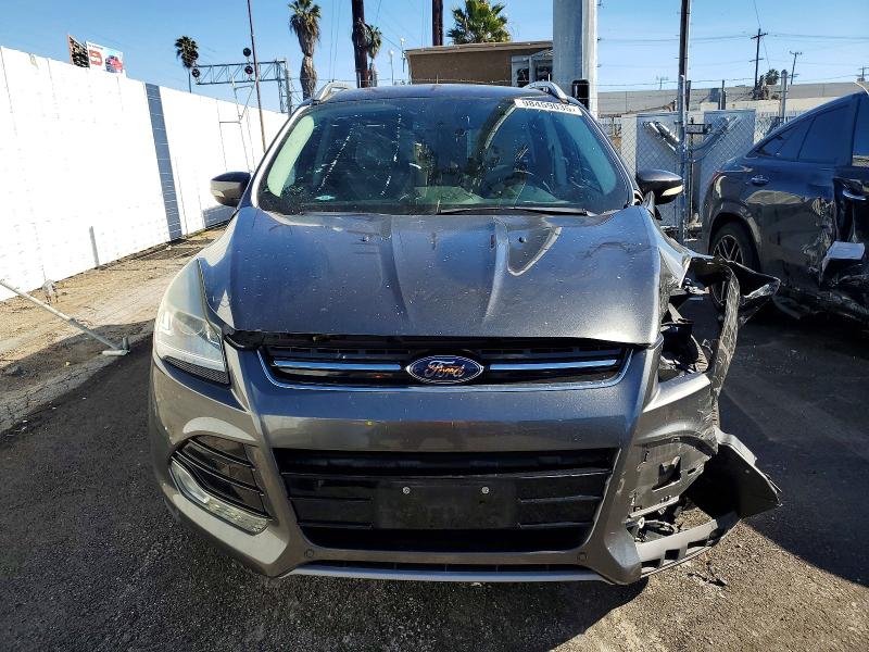 Photo 5 from auction – 2016 FORD ESCAPE with VIN 1FMCU0J97GUC59887