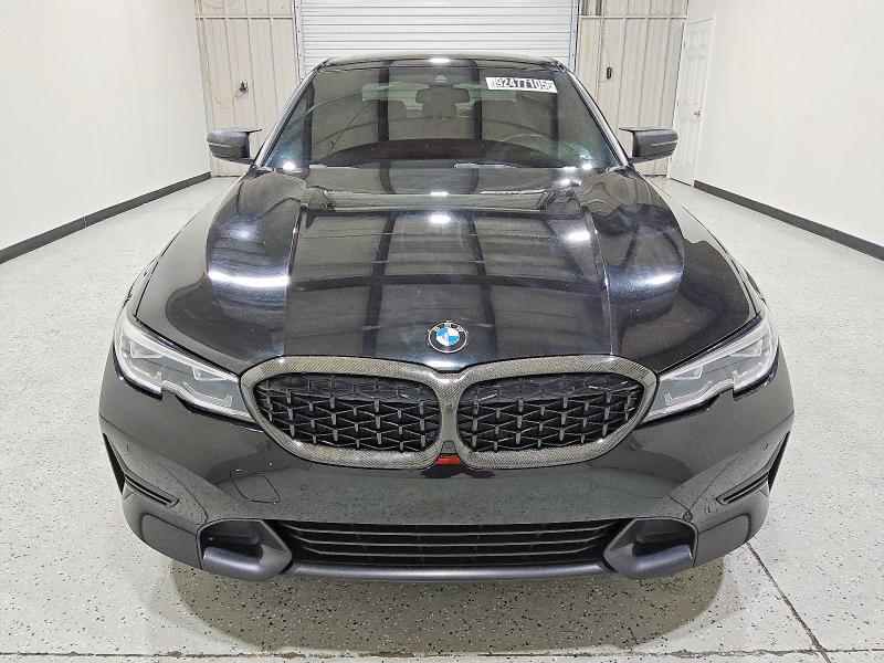 Photo 5 from auction – 2020 BMW 330I with VIN 3MW5R1J01L8B11857