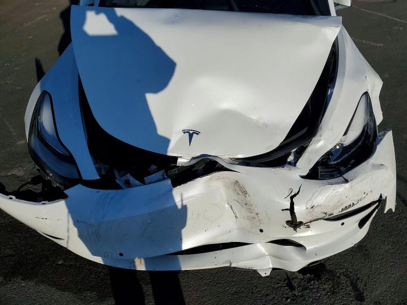 Photo 11 from auction – 2018 TESLA MODEL 3 with VIN 5YJ3E1EA6JF043671