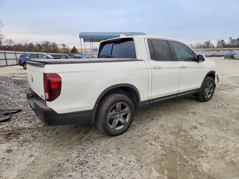 Photo 3 from auction – 2022 HONDA RIDGELINE with VIN 5FPYK3F70NB025824