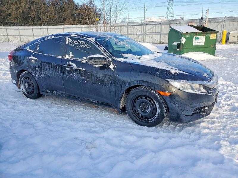 Photo 4 from auction – 2016 HONDA CIVIC LX with VIN 2HGFC2F59GH006256