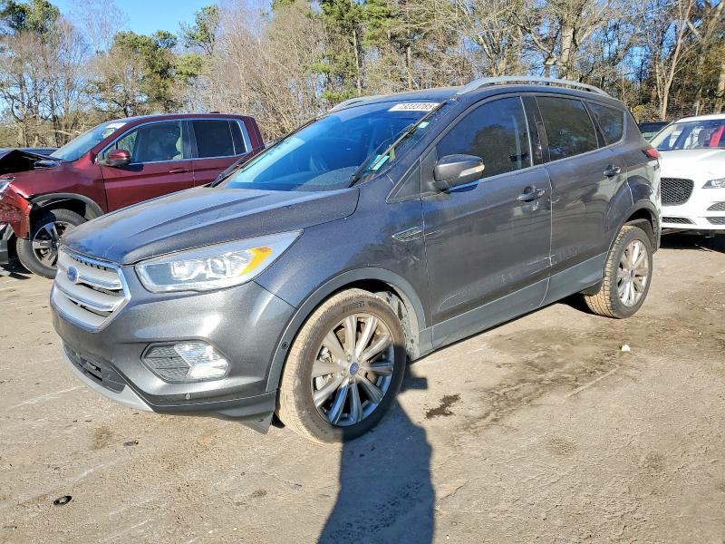 FORD ESCAPE TIT 2018 with VIN 1FMCU0J91JUB16733 - Photo from auction