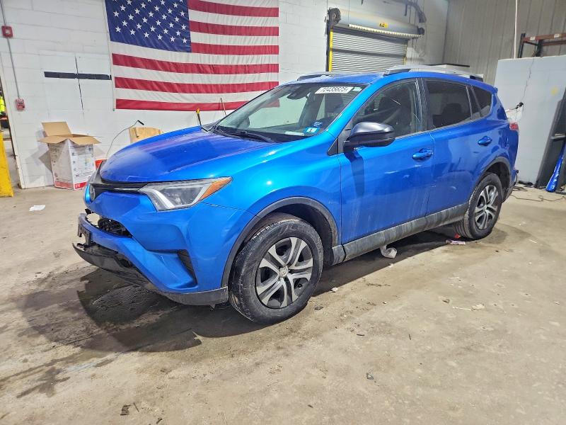 TOYOTA RAV4 LE 2017 with VIN 2T3BFREV7HW565014 - Photo from auction