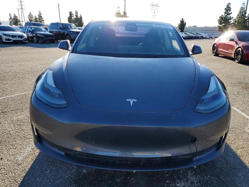 Photo 5 from auction – 2022 TESLA MODEL 3 with VIN 5YJ3E1EA6NF374837
