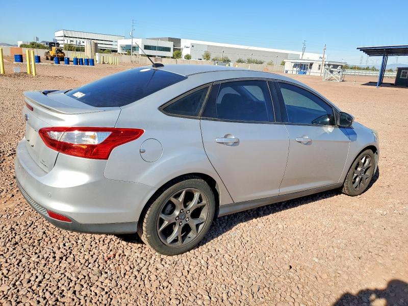 Photo 3 from auction – 2014 FORD FOCUS with VIN 1FADP3F24EL156657