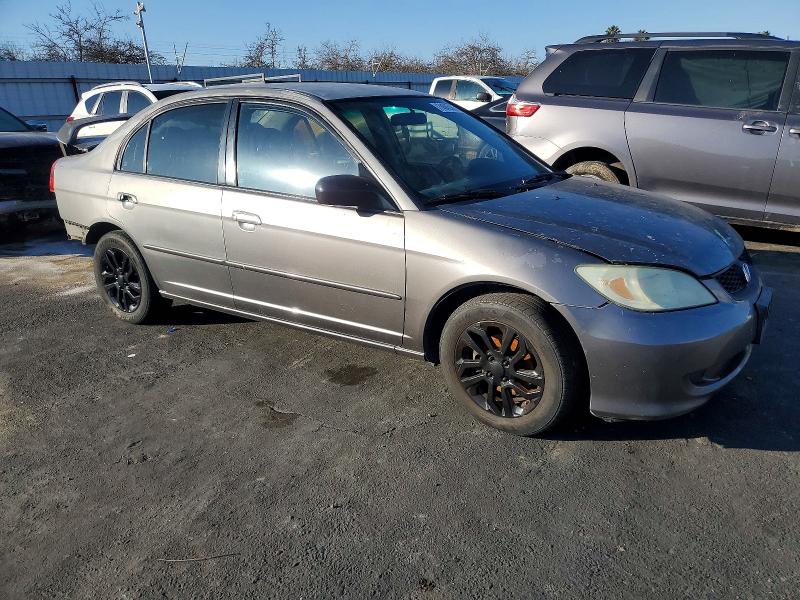 Photo 4 from auction – 2004 HONDA CIVIC LX with VIN 2HGES16514H511129