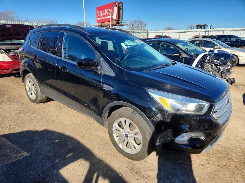 Photo 4 from auction – 2018 FORD ESCAPE with VIN 1FMCU0GD8JUA52685
