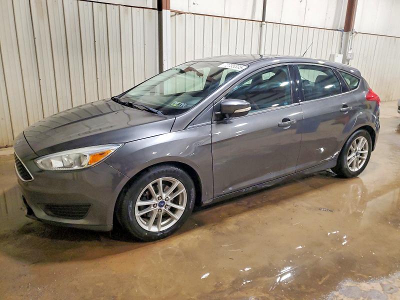 FORD FOCUS SE 2015 with VIN 1FADP3K28FL338398 - Photo from auction