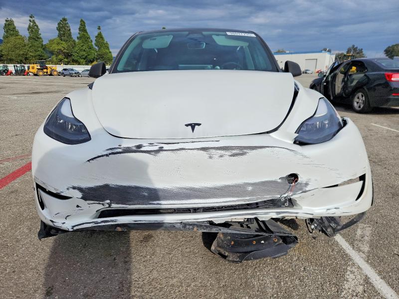 Photo 5 from auction – 2023 TESLA MODEL Y with VIN 7SAYGDEDXPF962628