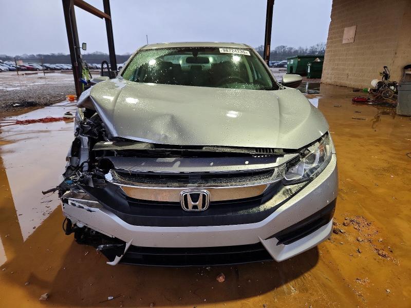 Photo 5 from auction – 2018 HONDA CIVIC EX with VIN 19XFC2F71JE035138