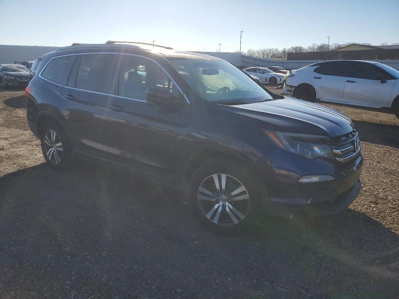 Photo 4 from auction – 2016 HONDA PILOT EXL with VIN 5FNYF6H59GB041095