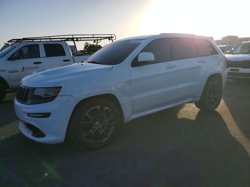 JEEP GRAND CHER 2014 with VIN 1C4RJFDJ2EC306598 - Photo from auction