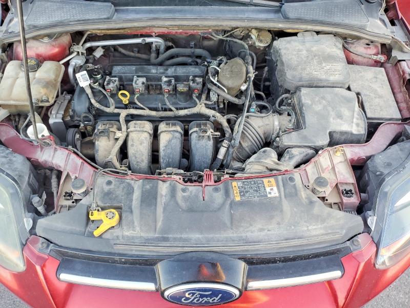 Photo 11 from auction – 2014 FORD FOCUS TITA with VIN 1FADP3N26EL454001