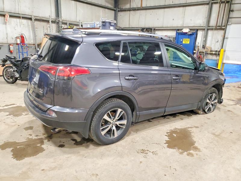 Photo 3 from auction – 2017 TOYOTA RAV4 XLE with VIN 2T3RFREVXHW681953