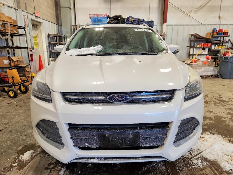 Photo 5 from auction – 2016 FORD ESCAPE TIT with VIN 1FMCU9J92GUA50481