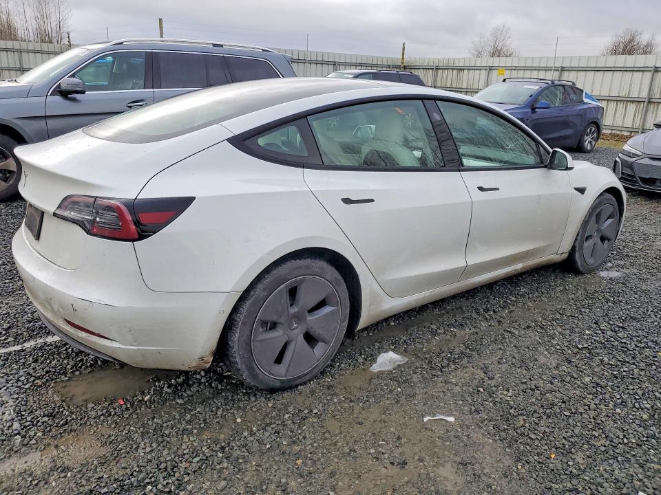 Photo 3 from auction – 2021 TESLA MODEL 3 with VIN 5YJ3E1EA6MF908644