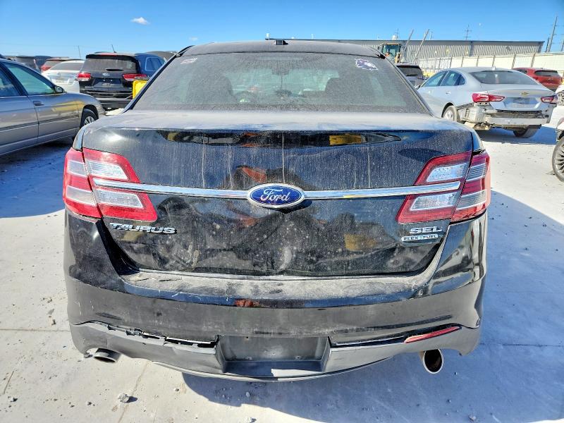 Photo 6 from auction – 2014 FORD TAURUS SEL with VIN 1FAHP2E81EG170641
