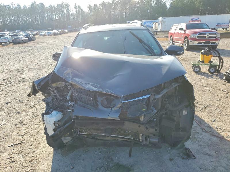 Photo 5 from auction – 2014 TOYOTA RAV4 with VIN 2T3WFREV7EW113772