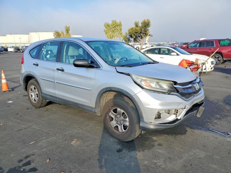 Photo 4 from auction – 2015 HONDA CR-V LX with VIN 5J6RM4H36FL075210