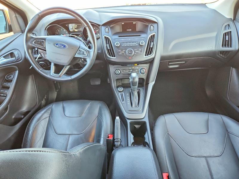 Photo 8 from auction – 2015 FORD FOCUS SE with VIN 1FADP3K21FL220385