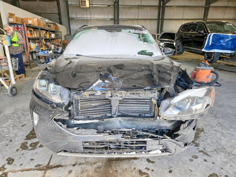 Photo 5 from auction – 2021 FORD ESCAPE with VIN 1FMCU9H98MUA57887