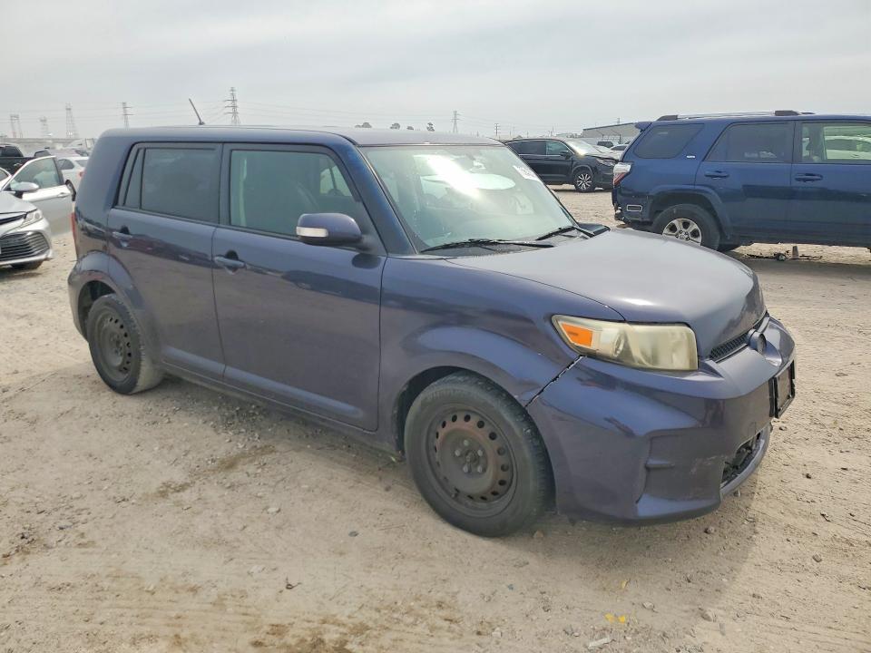 Photo 4 from auction – 2011 TOYOTA SCION with VIN JTLZE4FE7B1128501