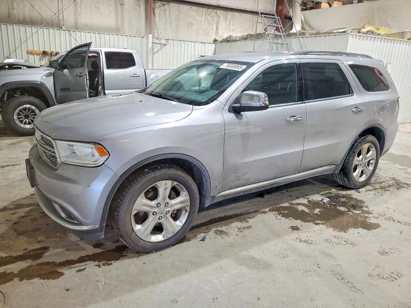 DODGE DURANGO 2014 with VIN 1C4RDJAG7EC977980 - Photo from auction