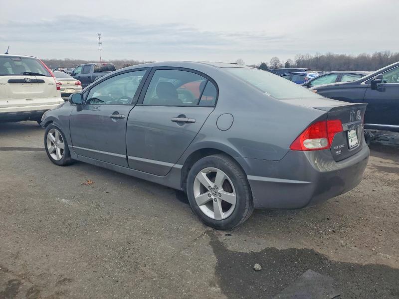 Photo 2 from auction – 2011 HONDA CIVIC LX-S with VIN 19XFA1F62BE022312