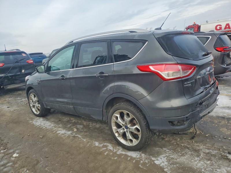 Photo 2 from auction – 2016 FORD ESCAPE TIT with VIN 1FMCU9J9XGUA93272