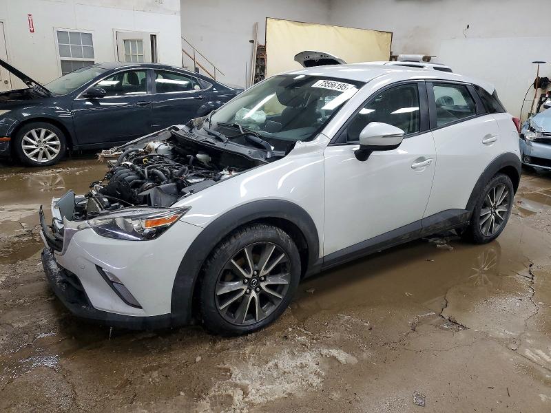 MAZDA CX-3 TOURI 2017 с VIN JM1DKFC72H0161887 - Снимка от търг