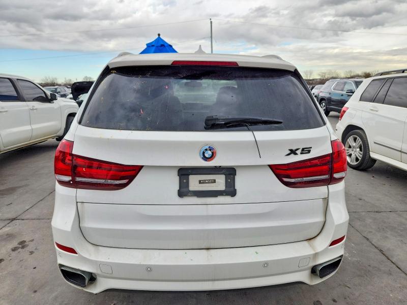 Photo 6 from auction – 2014 BMW X5 XDRIVE5 with VIN 5UXKR6C59E0J73188