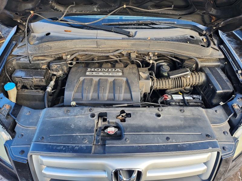 Photo 12 from auction – 2006 HONDA PILOT EX with VIN 2HKYF18646H505082